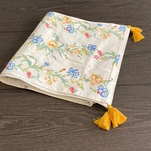 White floral table runner. With yellow tassels. Excellent condition!